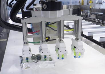 Ventosas Piab en sistema de garras para envases creadas por Tecno Pack SpA