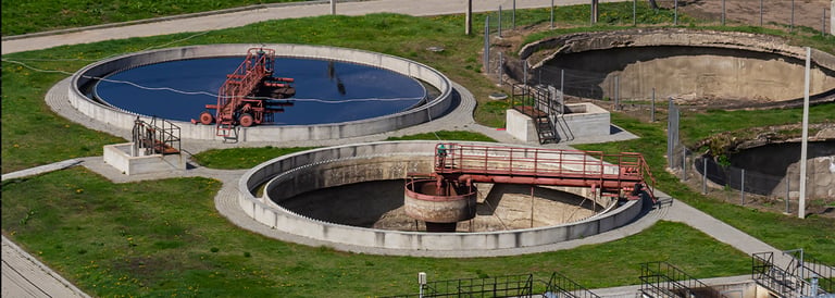 What does "PE" mean in a wastewater treatment plant?