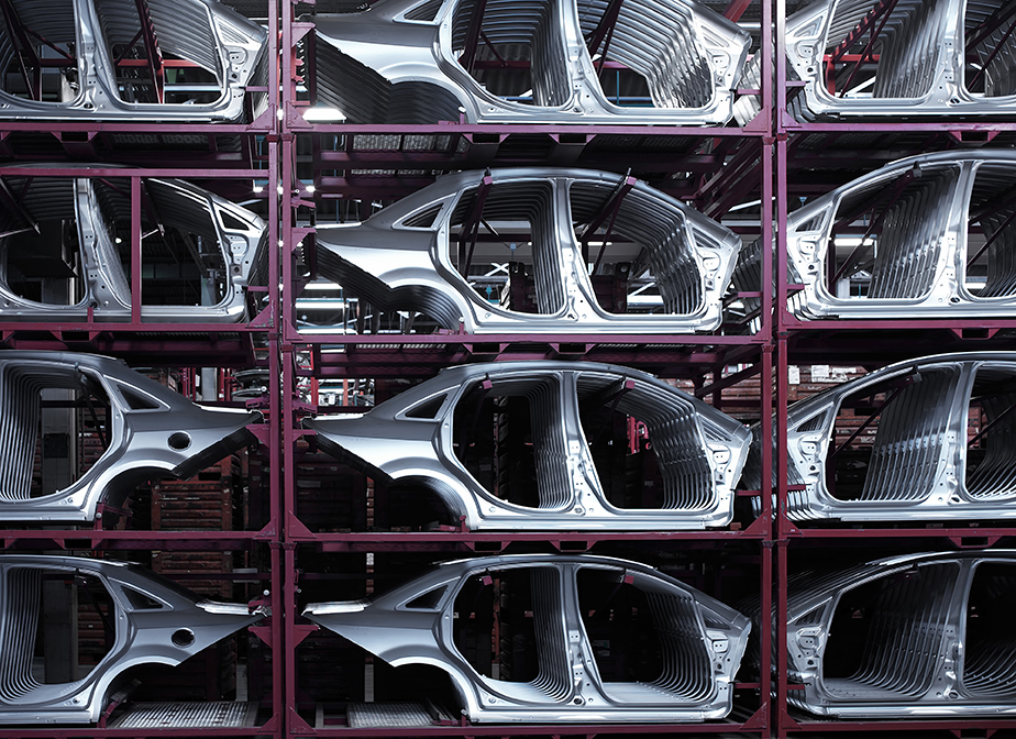 Auto-racking unloading and assembly