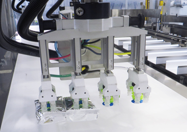Automatic handling of packaged biscuits with Piab’s vacuum technology